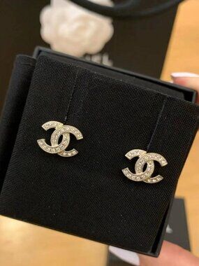 Authentic pre-owned Chanel earrings, featuring the double C logo